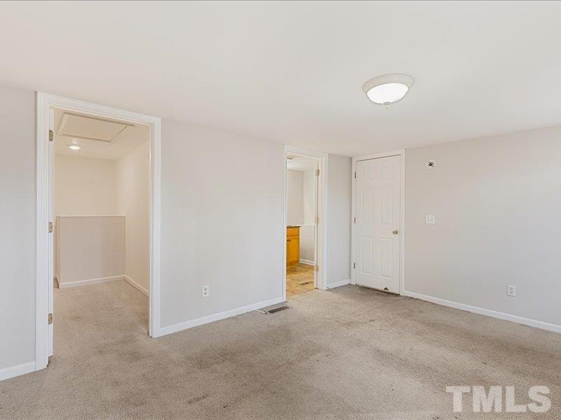 4010 Hurst Drive Franklinton, NC 27525 - Photo 25 of 32 an empty room with an entryway
