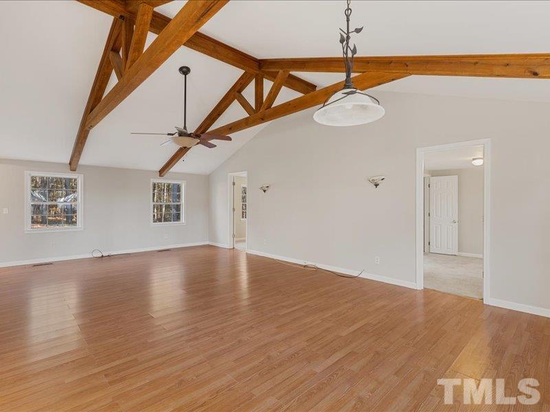 4010 Hurst Drive Franklinton, NC 27525 - Photo 4 of 32 a view of an empty room with wooden floor
