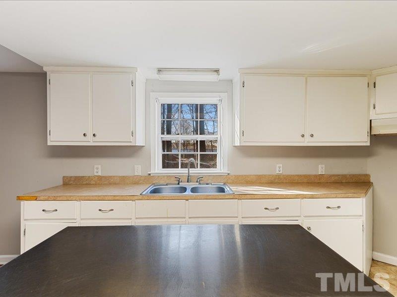 4010 Hurst Drive Franklinton, NC 27525 - Photo 10 of 32 a kitchen that has a sink and a stove