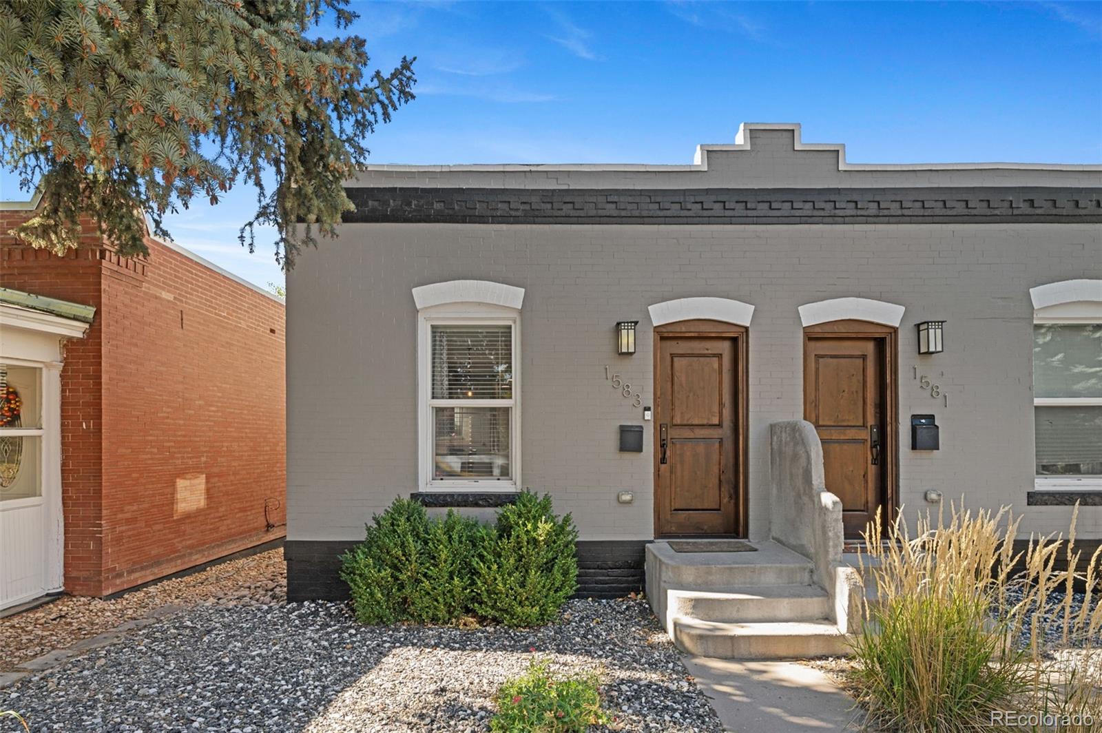 1583 South Ogden Street, Unit 1583 Denver, CO 80210 - Photo 28 of 28 a front view of a house