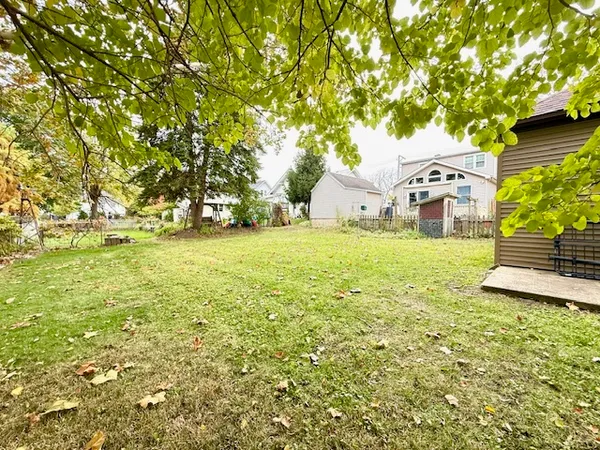 a view of a house with a big yard