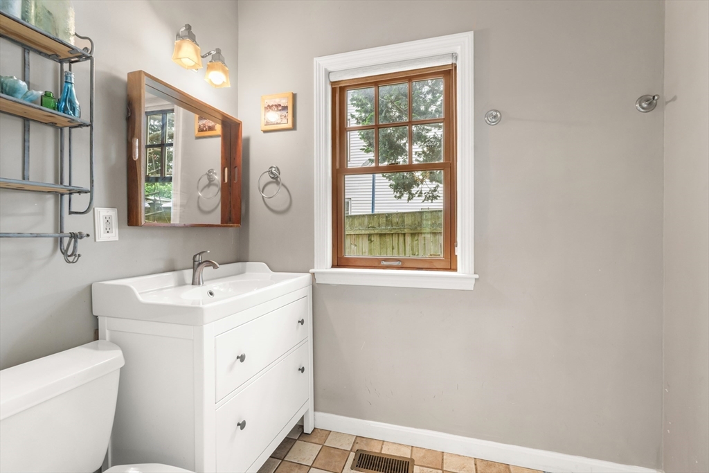 29 Dell Avenue Boston, MA 02136 - Photo 12 of 28 a view of bathroom with a sink and a toilet