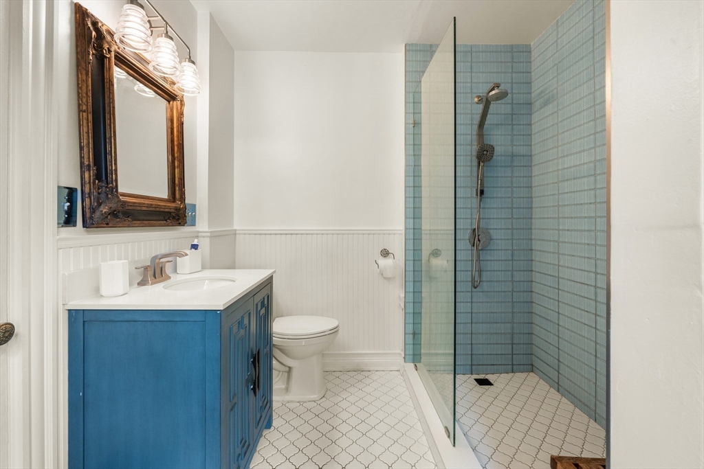 29 Dell Avenue Boston, MA 02136 - Photo 15 of 28 a bathroom with a sink toilet and shower
