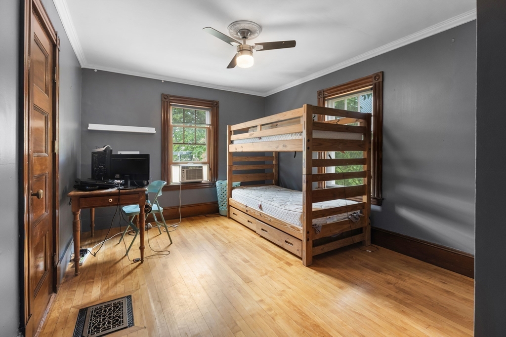 29 Dell Avenue Boston, MA 02136 - Photo 18 of 28 a bedroom with furniture and a window