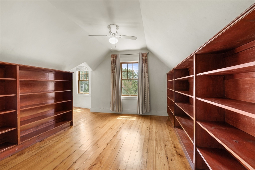 29 Dell Avenue Boston, MA 02136 - Photo 20 of 28 a view of an empty room with wooden floor and a window