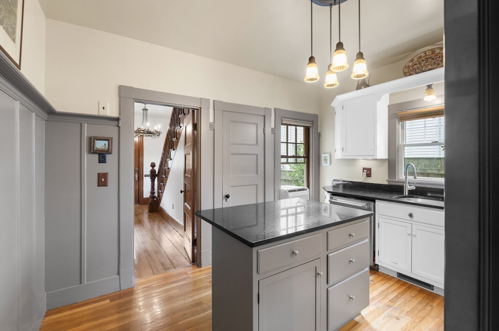 29 Dell Avenue Boston, MA 02136 - Photo 9 of 28 a kitchen with stainless steel appliances granite countertop a sink refrigerator and cabinets