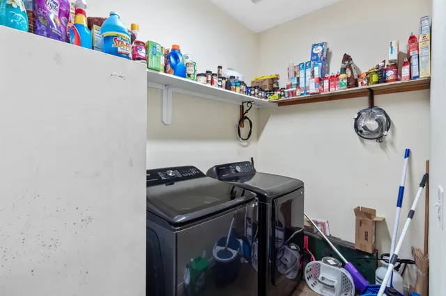 a utility room with dryer and washer