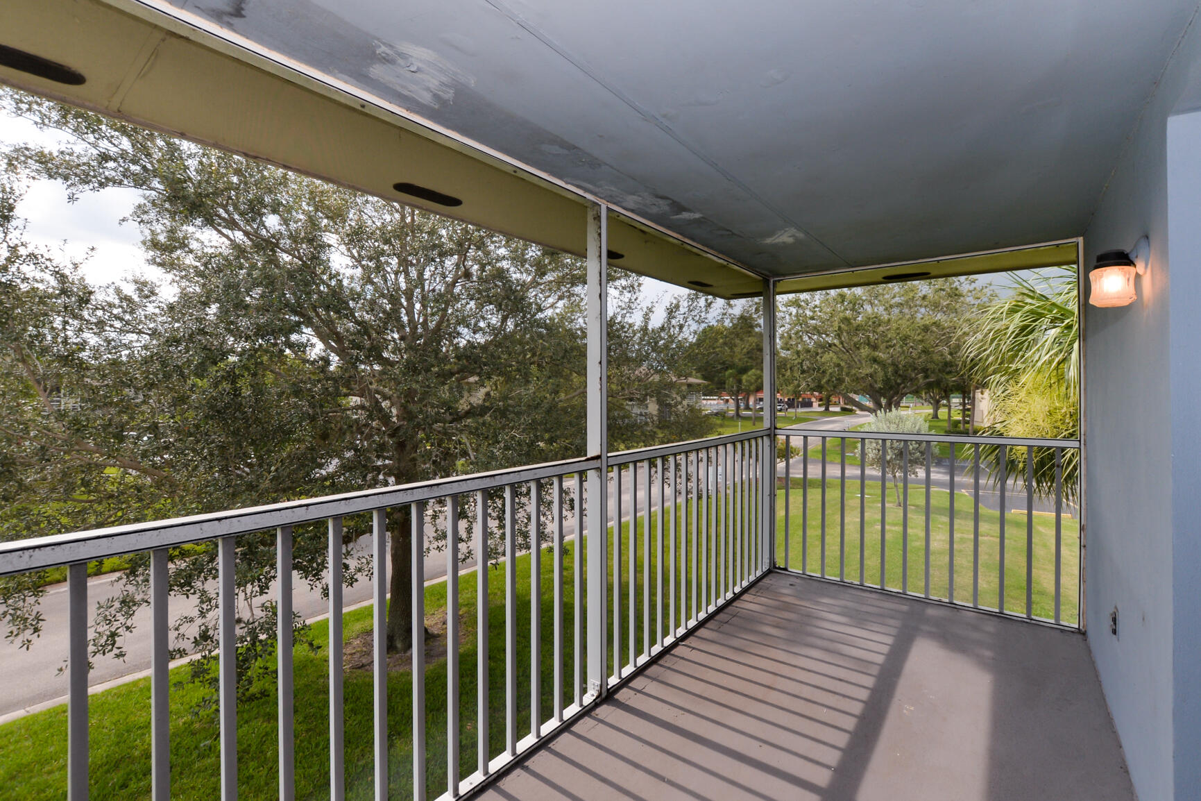 8 Lake Vista Trail, Unit 205 Port St. Lucie, FL 34952 - Photo 15 of 24 a view of a balcony