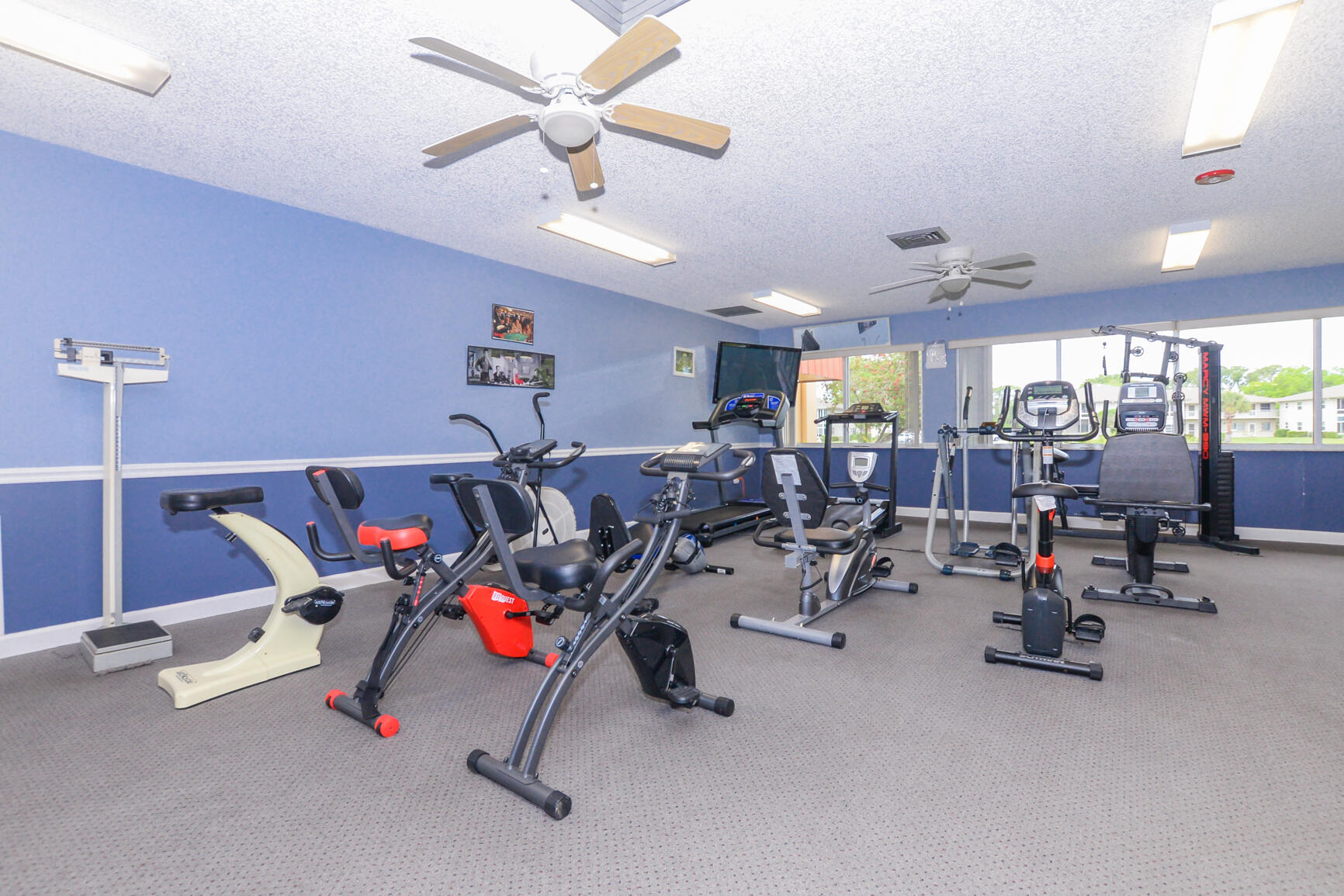 8 Lake Vista Trail, Unit 205 Port St. Lucie, FL 34952 - Photo 21 of 24 a view of a room with gym equipment