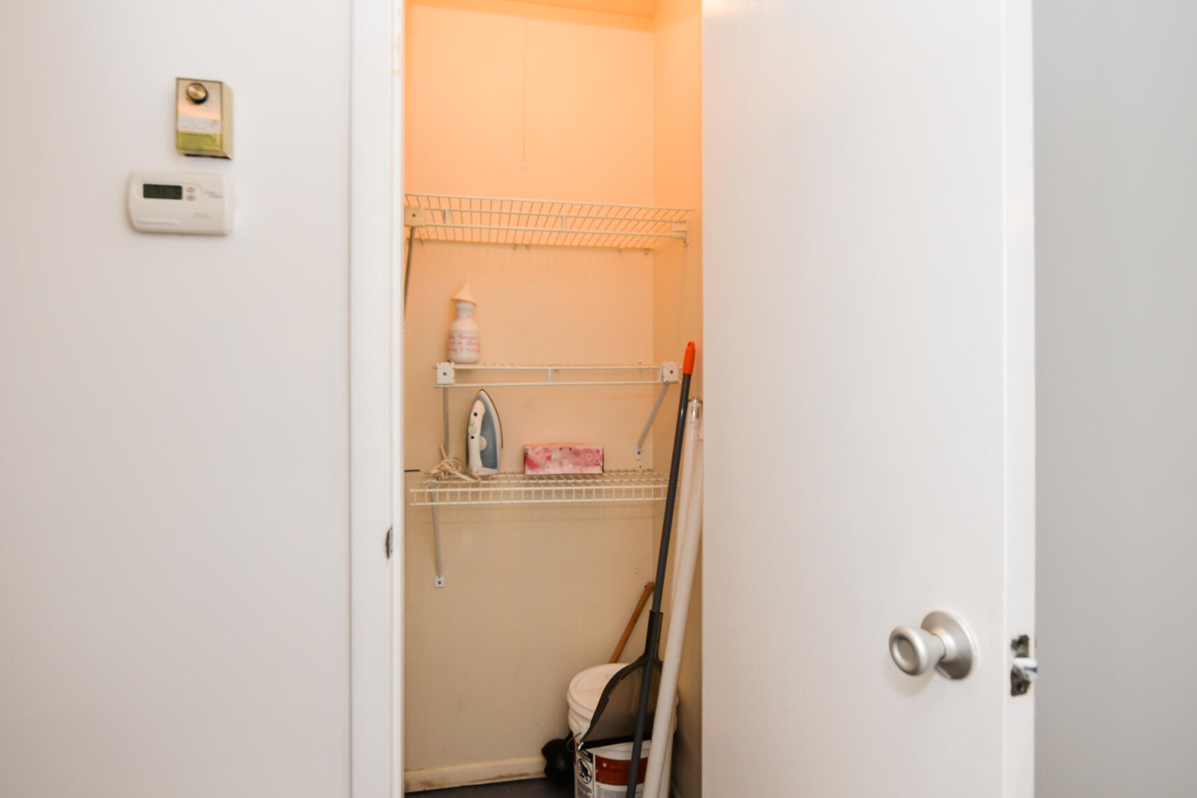 8 Lake Vista Trail, Unit 205 Port St. Lucie, FL 34952 - Photo 10 of 24 a view of a closet with storage