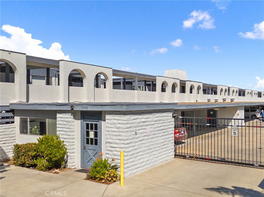3606 Vista Rey, Unit 31 Oceanside, CA 92057 - Photo 44 of 50 Parking area and gated entrance