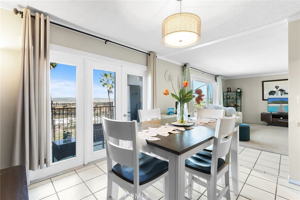 3606 Vista Rey, Unit 31 Oceanside, CA 92057 - Photo 9 of 50 Dining area is open to the living area and kitchen