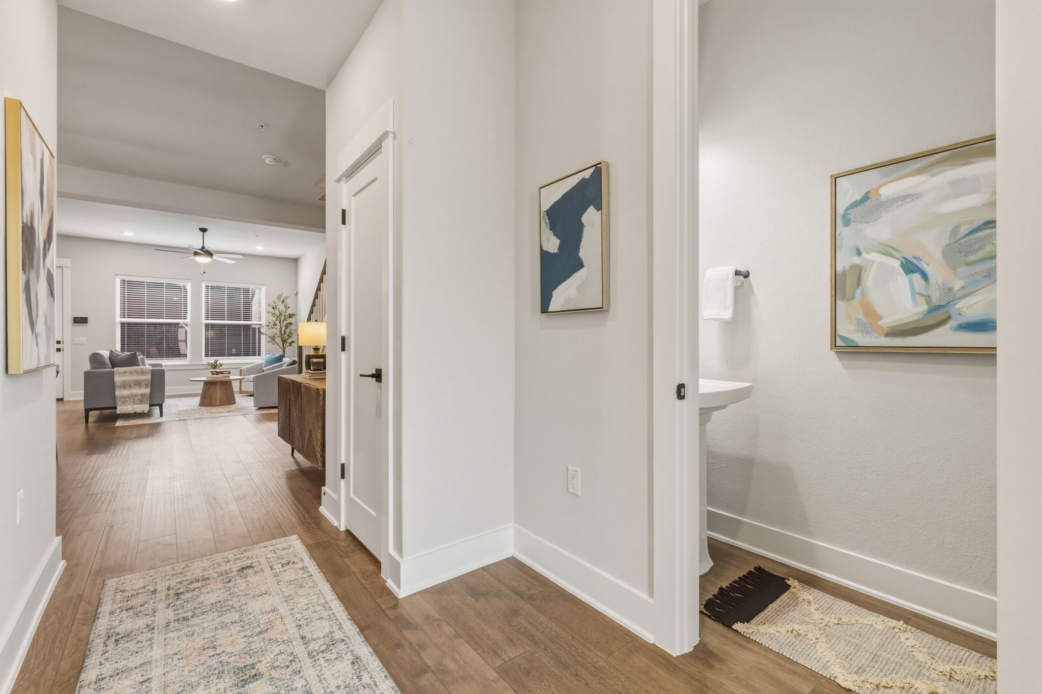 2929 Moreno Street Austin, TX 78723 - Photo 6 of 40 Open-concept living area with wood-finish flooring, recessed lighting, and a ceiling fan