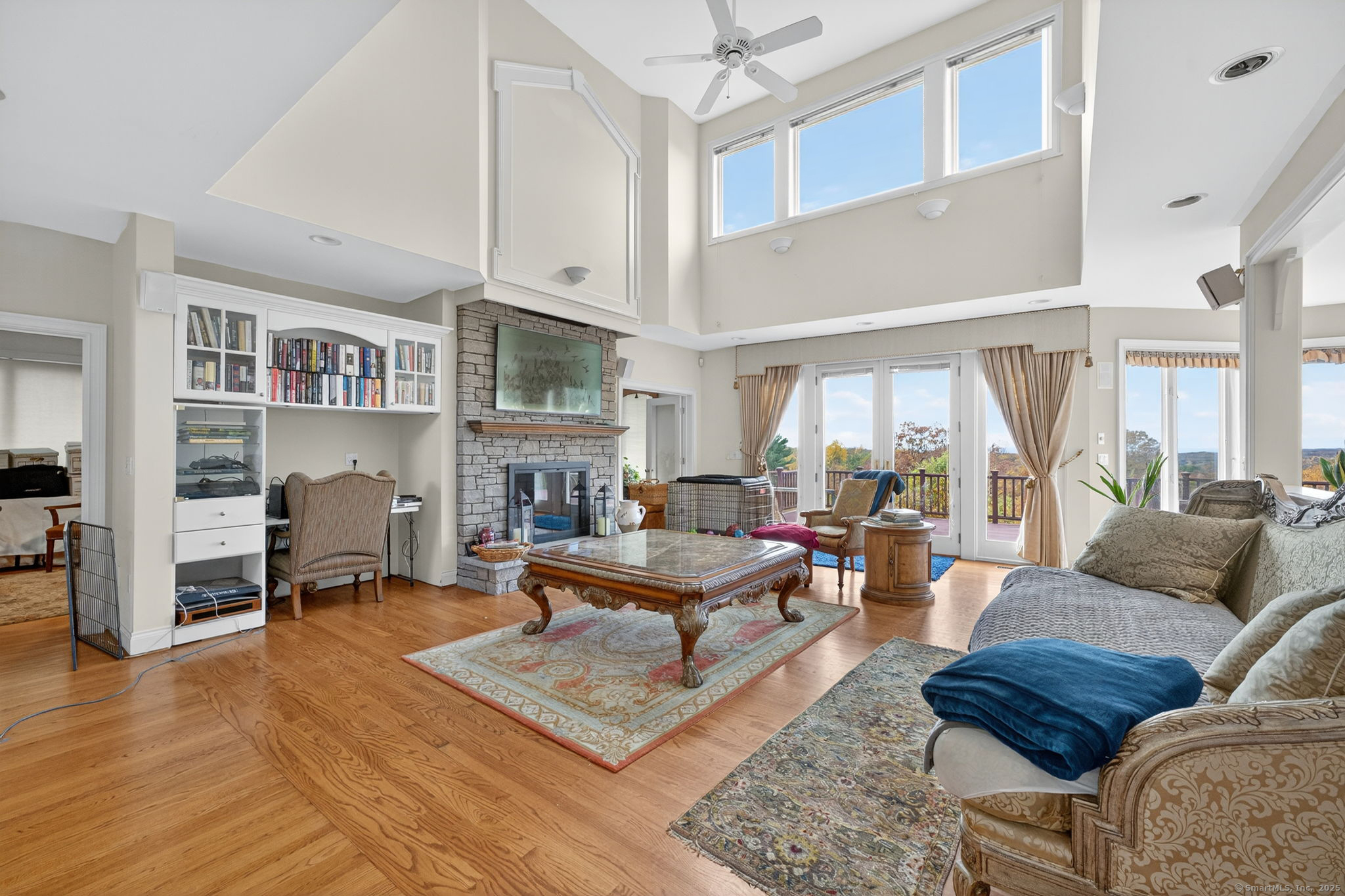 87 Colton Road Glastonbury, CT 06033 - Photo 15 of 39 a living room with furniture or couch and a fireplace