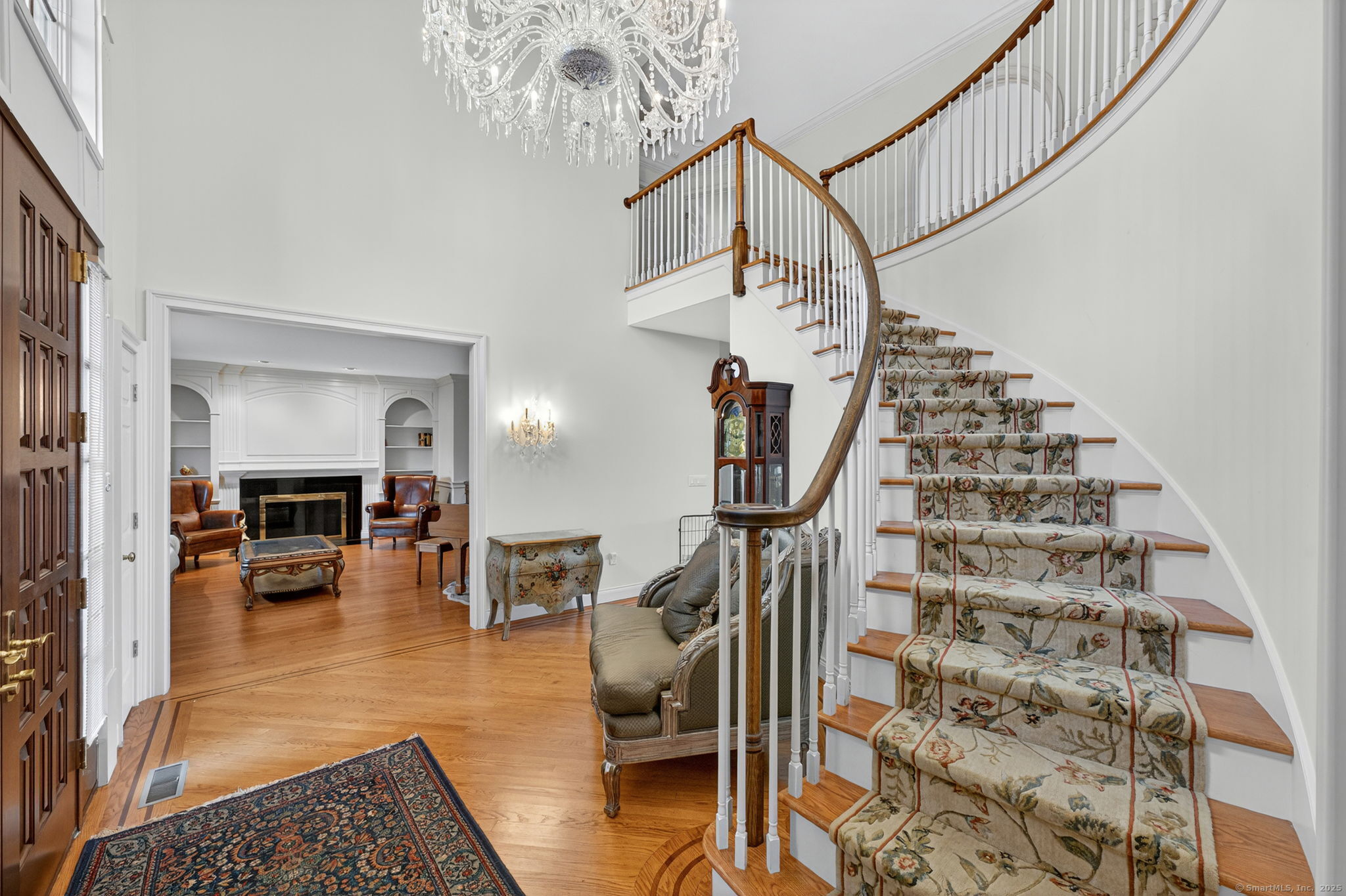 87 Colton Road Glastonbury, CT 06033 - Photo 16 of 39 a view of entryway livingroom and hall with wooden floor