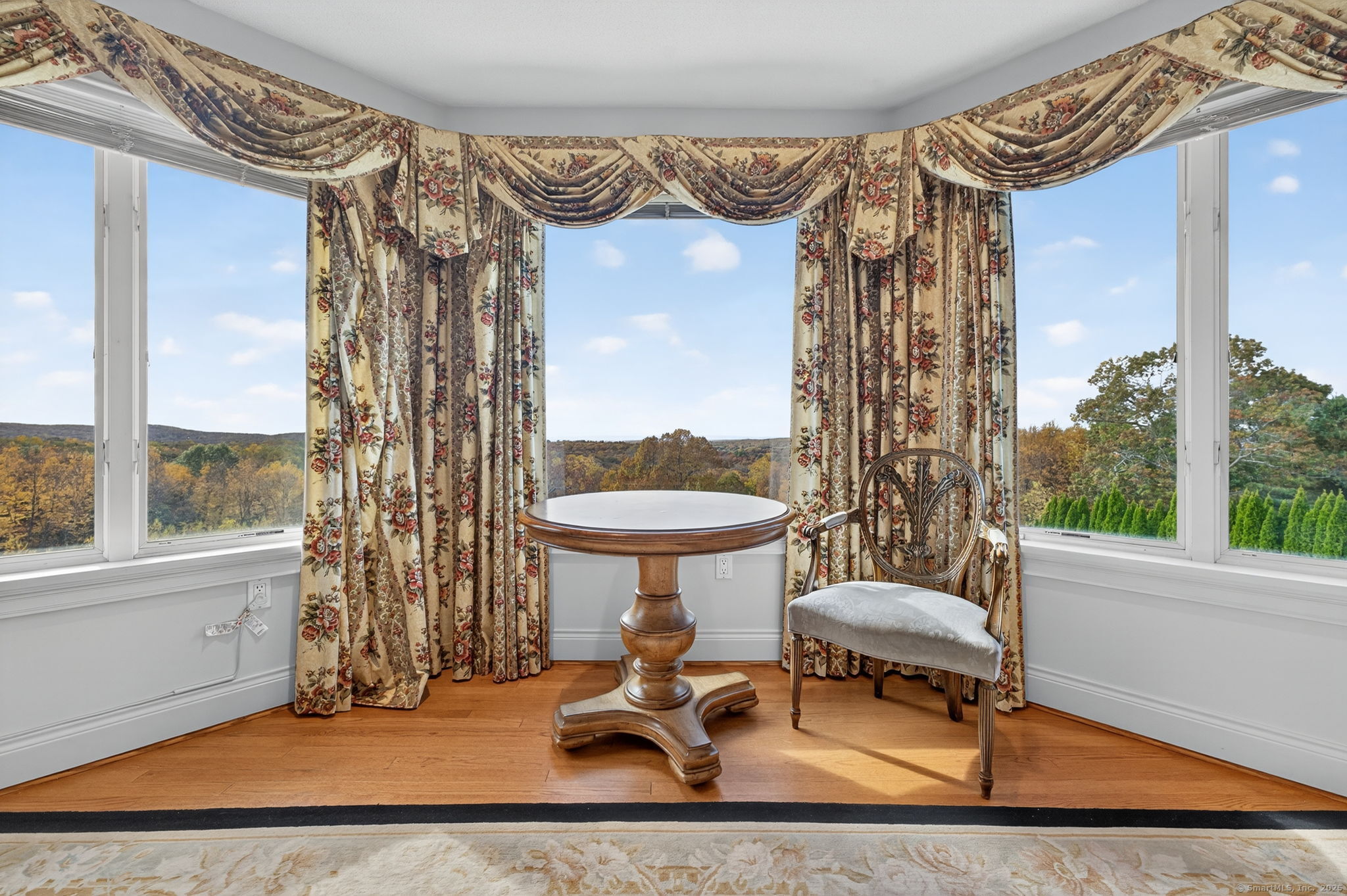 87 Colton Road Glastonbury, CT 06033 - Photo 18 of 39 a living room with a couch and a table