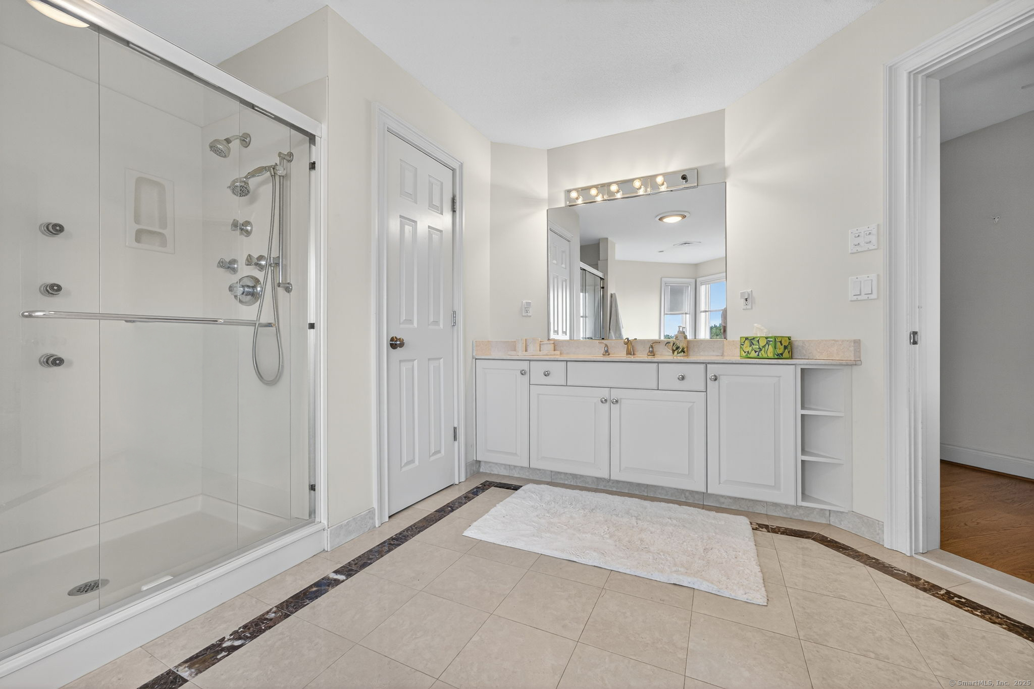 87 Colton Road Glastonbury, CT 06033 - Photo 20 of 39 a view of a bathroom with a shower and a sink