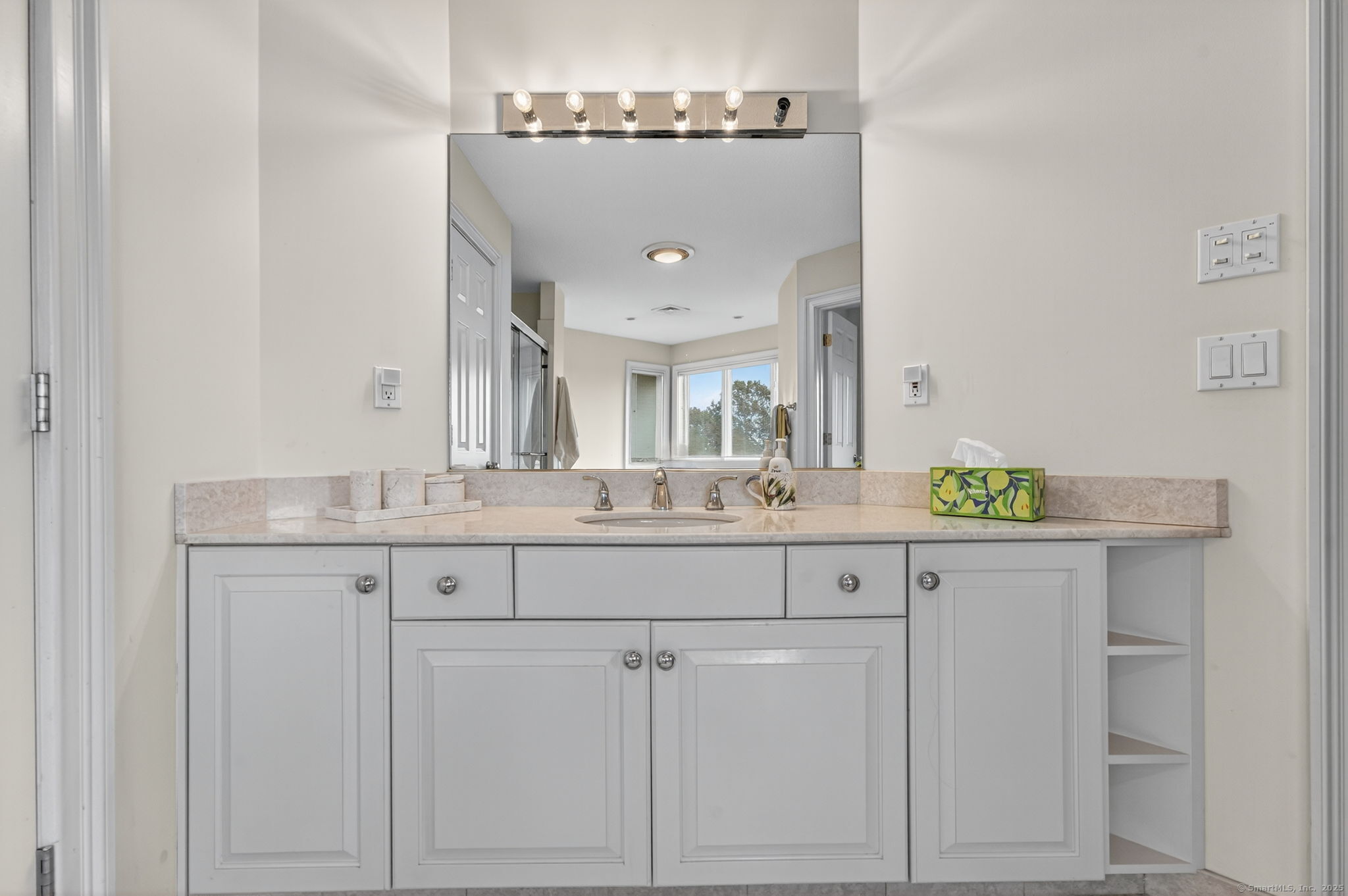 87 Colton Road Glastonbury, CT 06033 - Photo 21 of 39 a bathroom with double sink and a mirror