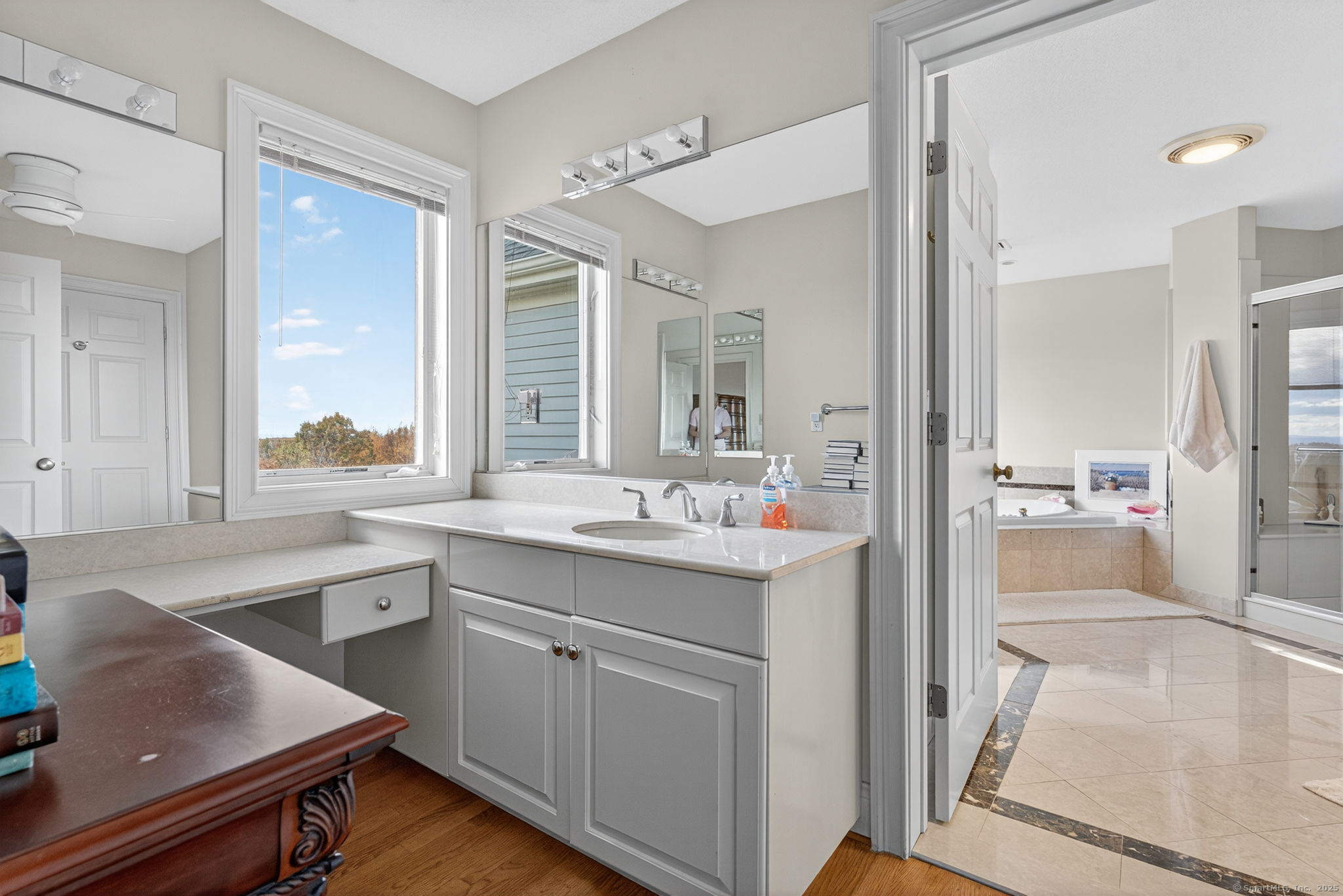 87 Colton Road Glastonbury, CT 06033 - Photo 24 of 39 a kitchen with a sink stove and cabinets