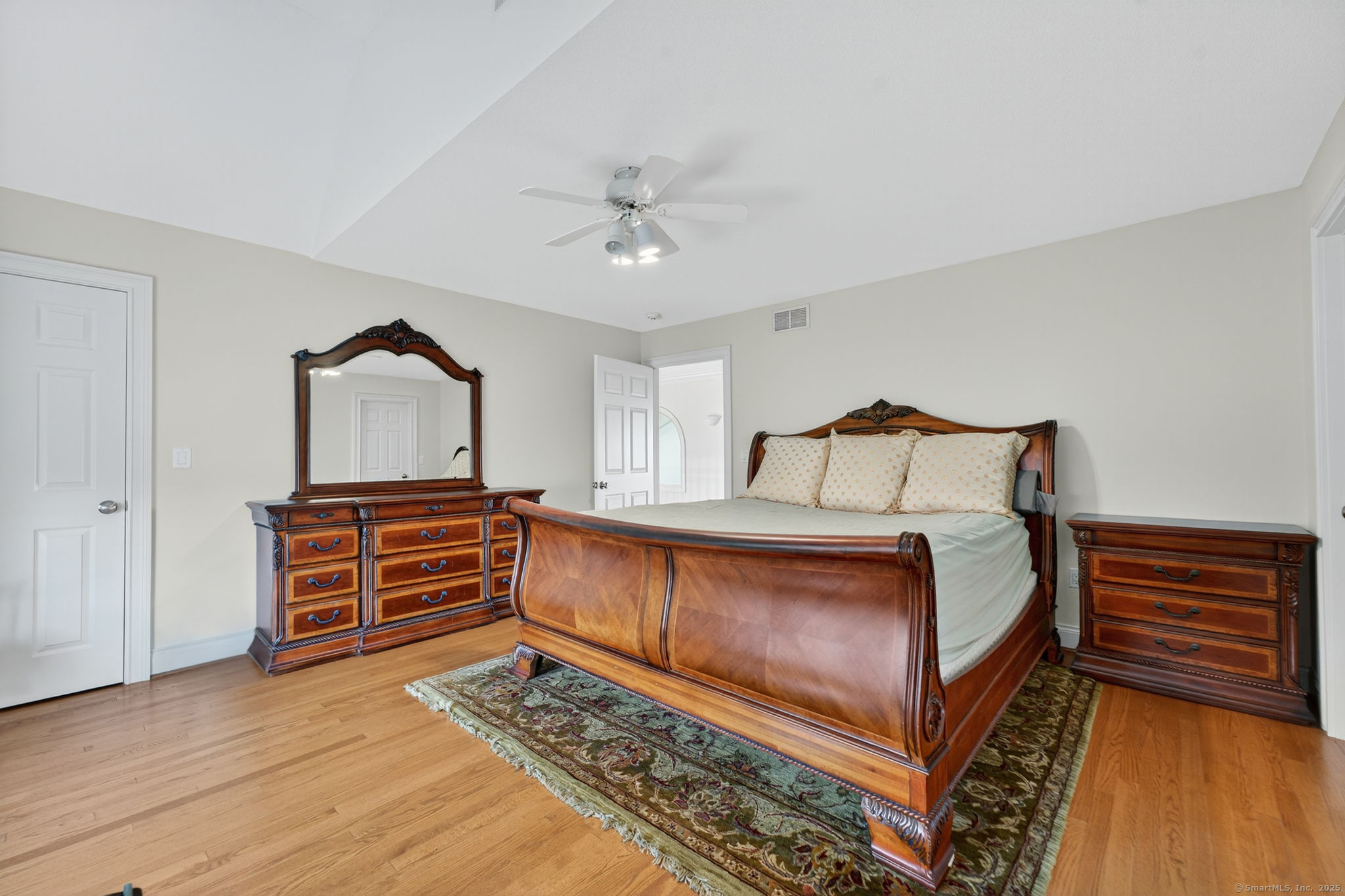 87 Colton Road Glastonbury, CT 06033 - Photo 29 of 39 a bedroom with a bed and wooden floor