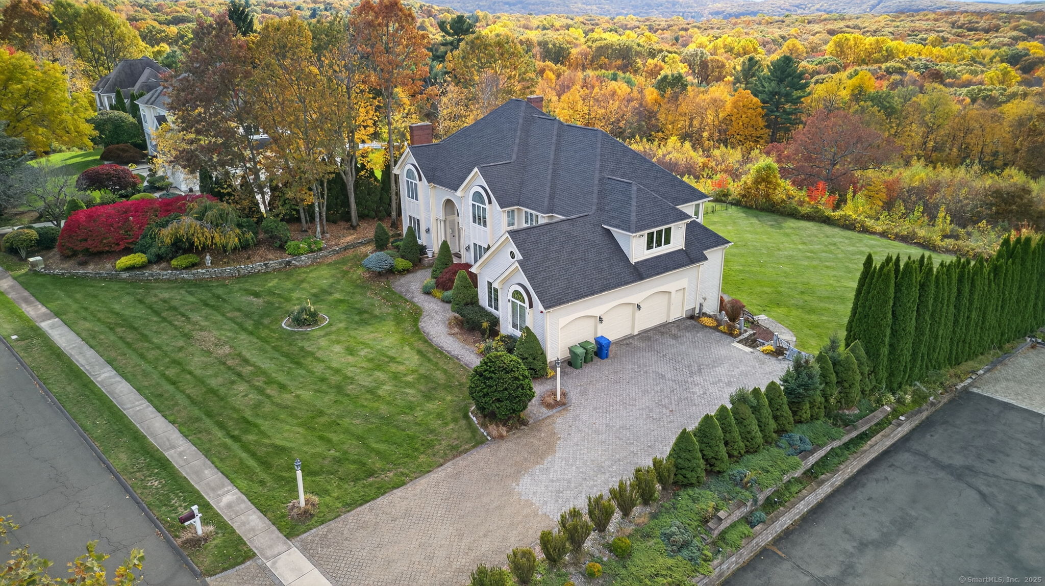87 Colton Road Glastonbury, CT 06033 - Photo 3 of 39 a view of a garden with a house