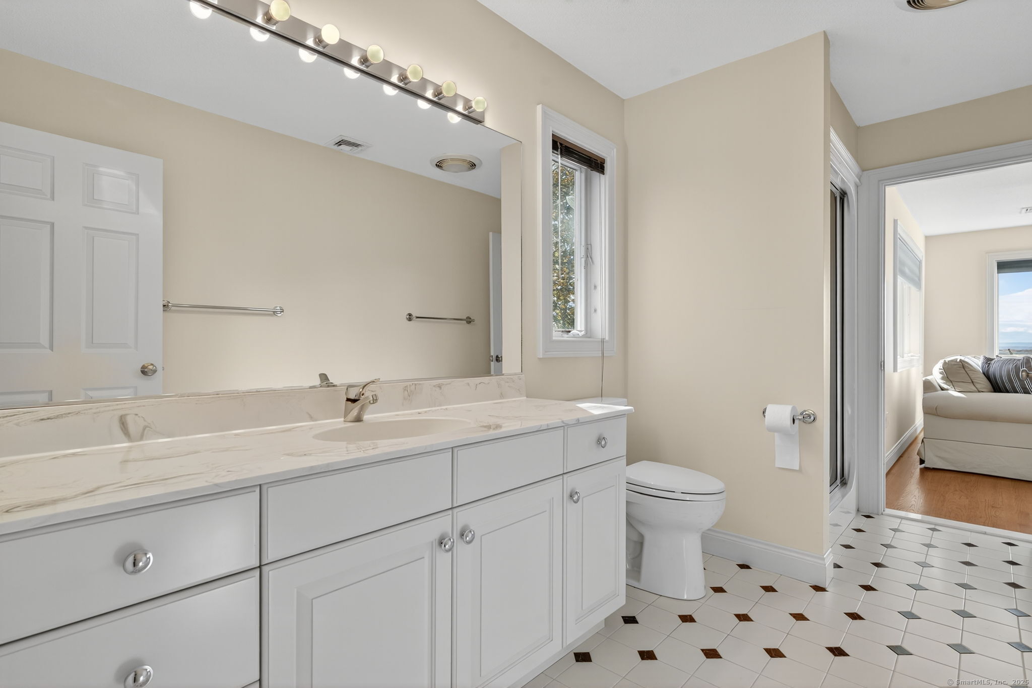 87 Colton Road Glastonbury, CT 06033 - Photo 32 of 39 a bathroom with a sink a toilet and shower