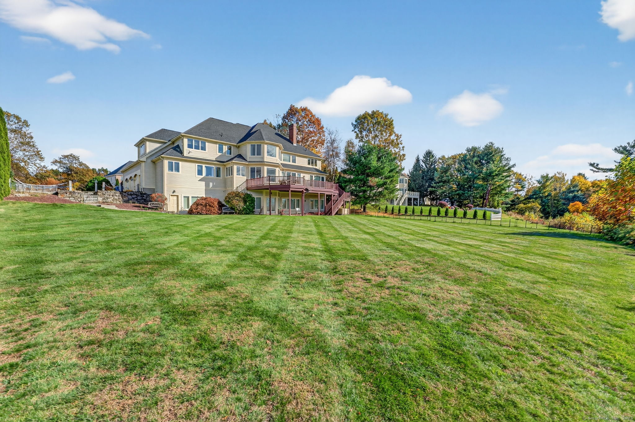 87 Colton Road Glastonbury, CT 06033 - Photo 37 of 39 a view of a house with a big yard and large trees