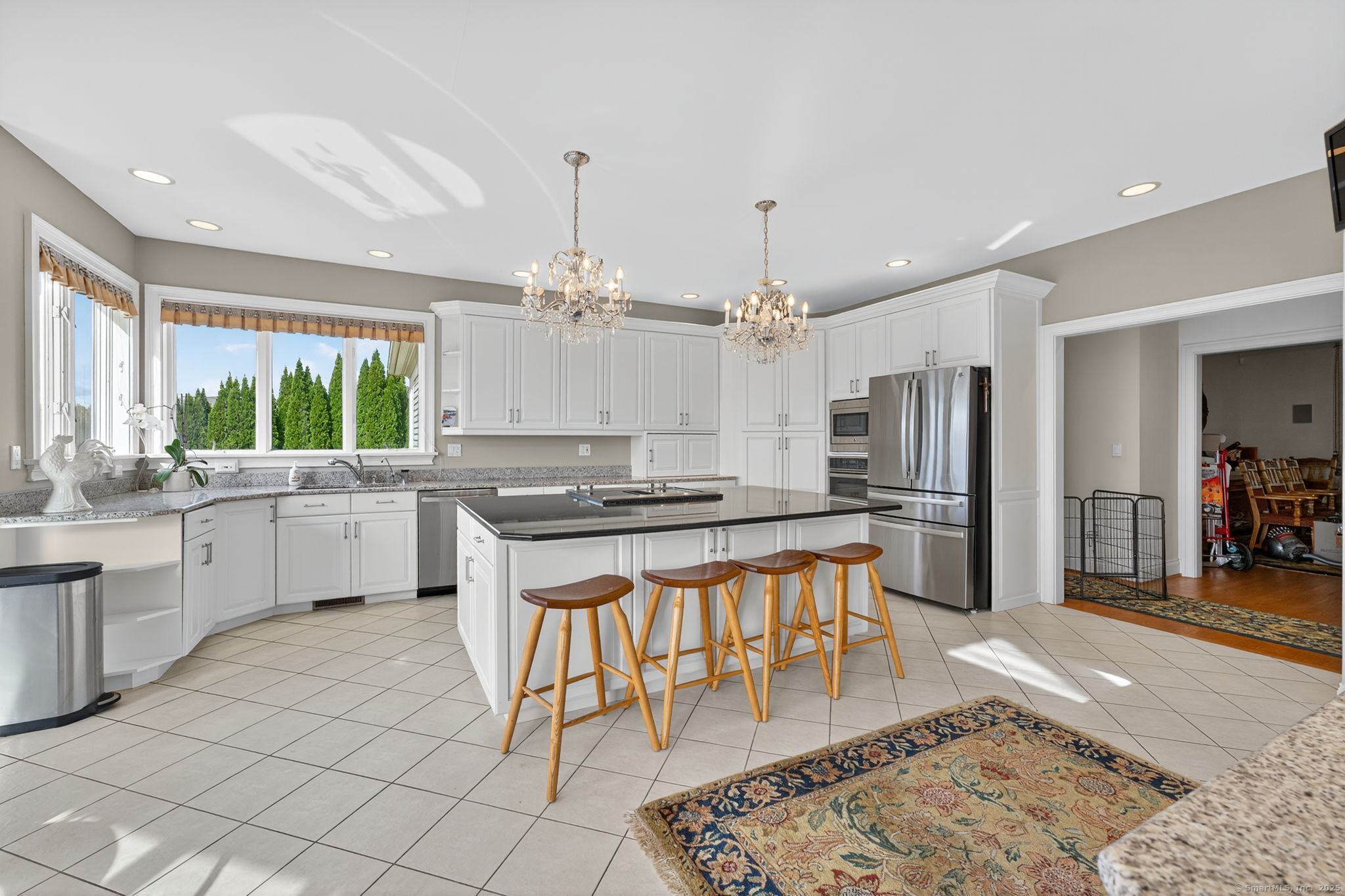 87 Colton Road Glastonbury, CT 06033 - Photo 6 of 39 a kitchen with stainless steel appliances kitchen island granite countertop a sink and cabinets