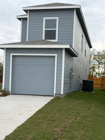 a house view with a backyard space