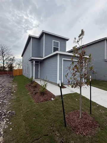 a house view with a backyard space