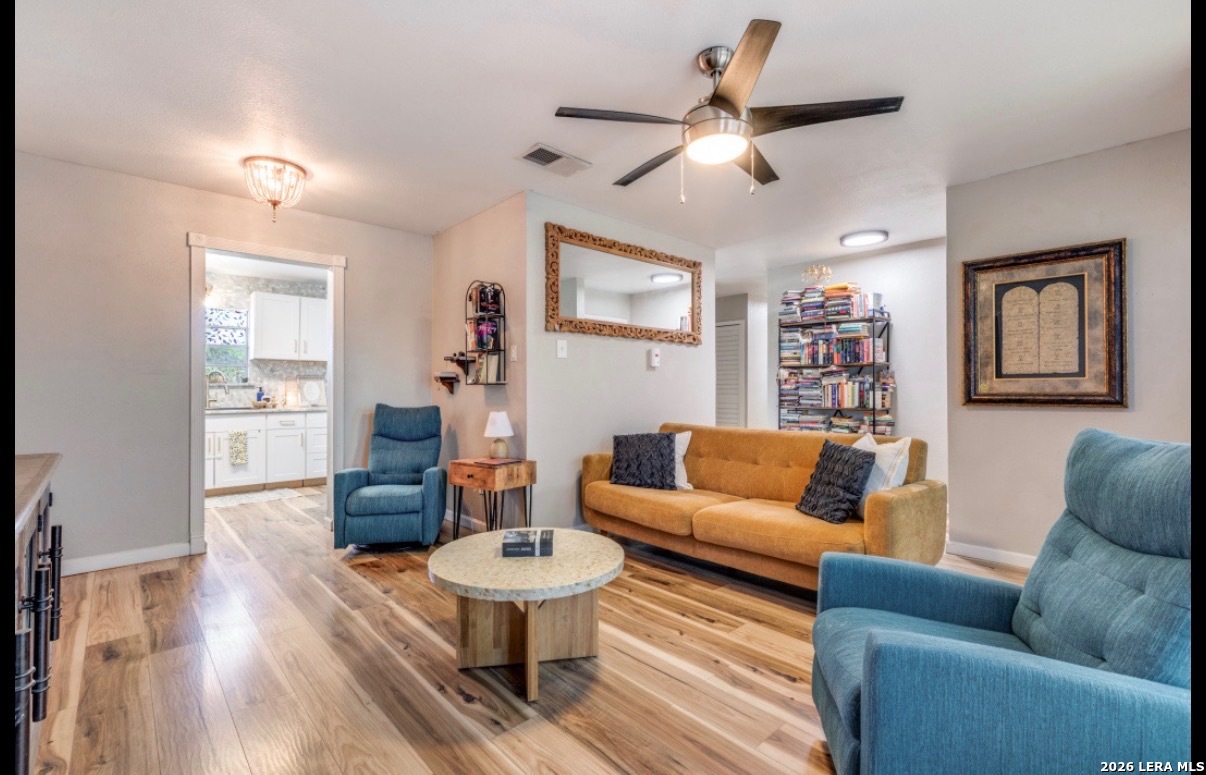 507 Stimmel Drive San Antonio, TX 78227 - Photo 2 of 7 a living room with furniture and a wooden floor