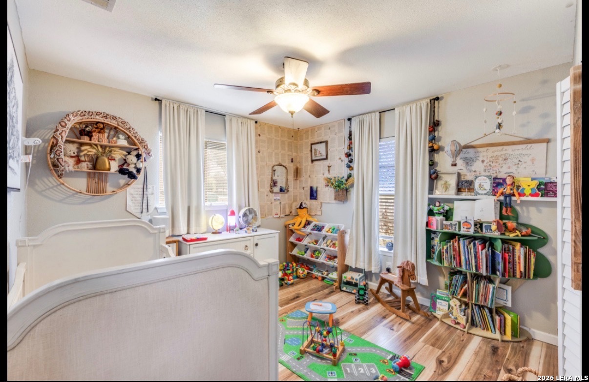 507 Stimmel Drive San Antonio, TX 78227 - Photo 5 of 7 a living room with lots of furniture and a chandelier