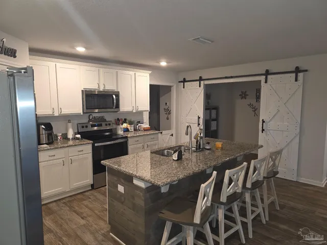 a view of a hallway with elevator