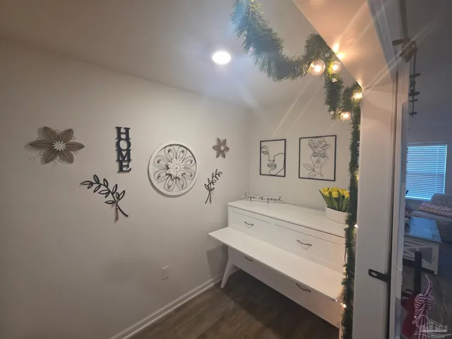 a view of a livingroom with storage space