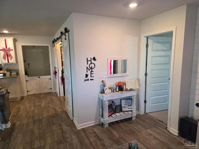 a bathroom with a mirror and a sink