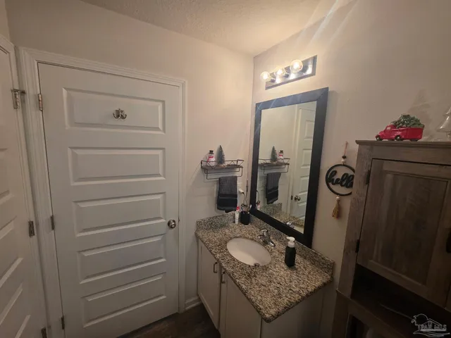 a view of a porch with a garden