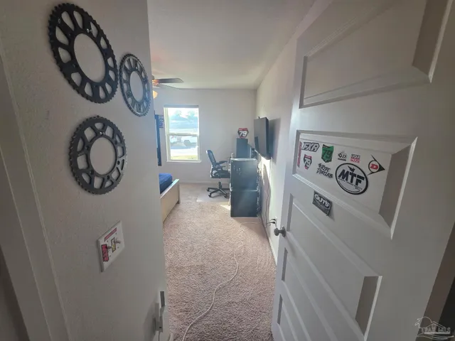 a view of a backyard with pathway