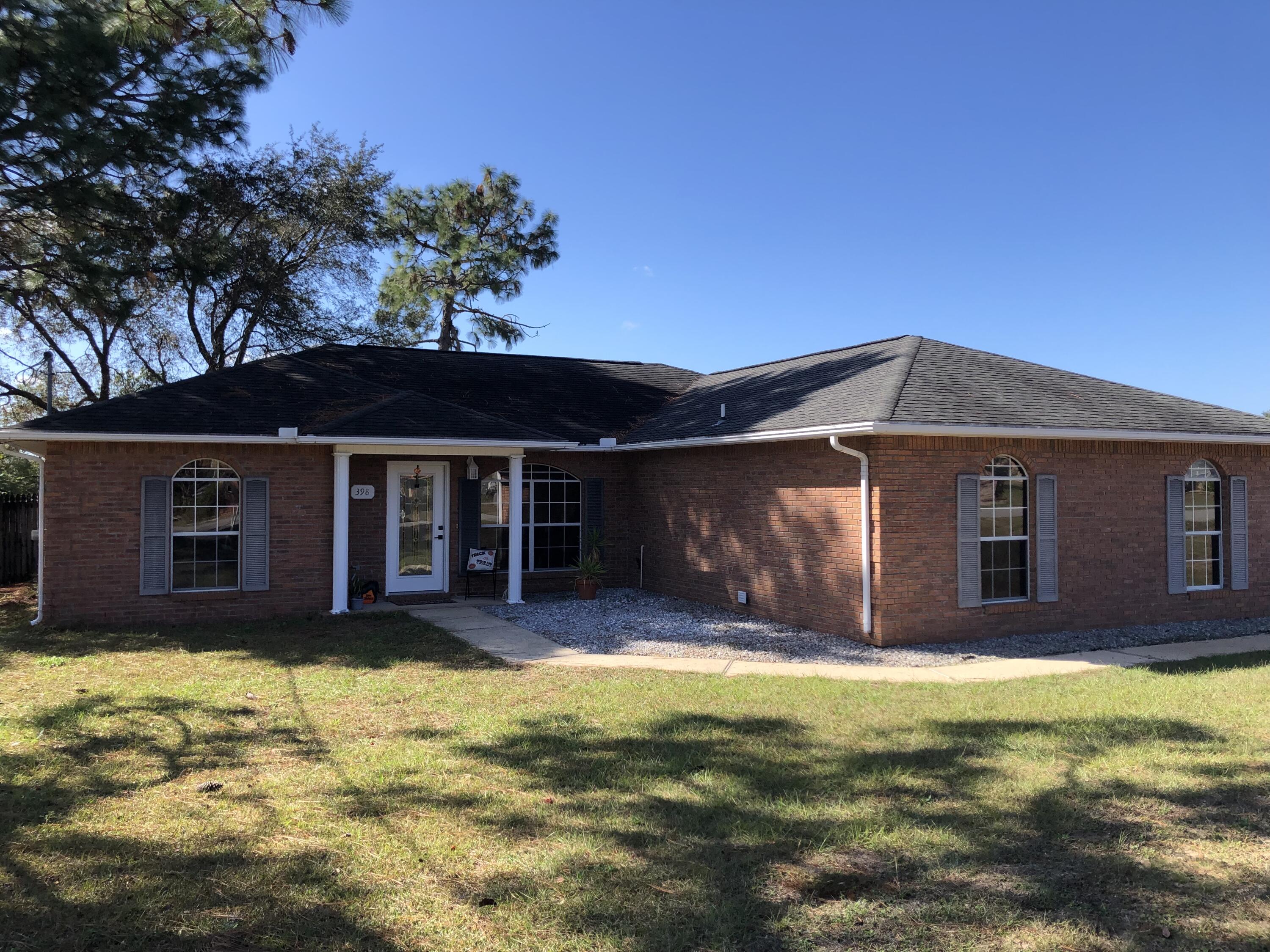 398 Riverchase Boulevard Crestview, FL 32536 - Photo 1 of 36 a view of a house with a yard