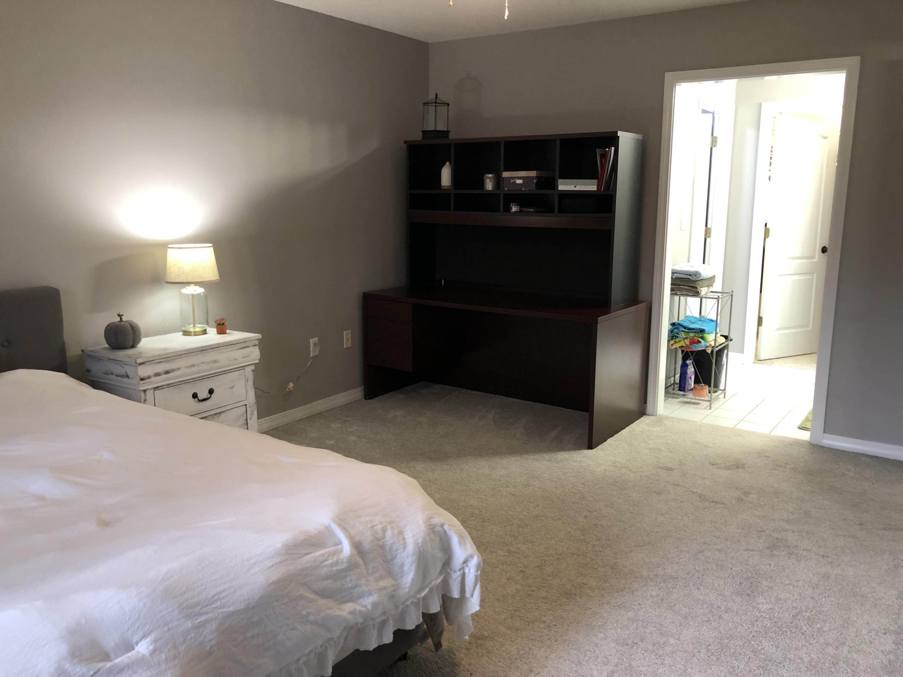 398 Riverchase Boulevard Crestview, FL 32536 - Photo 15 of 36 a bedroom with a bed and a closet