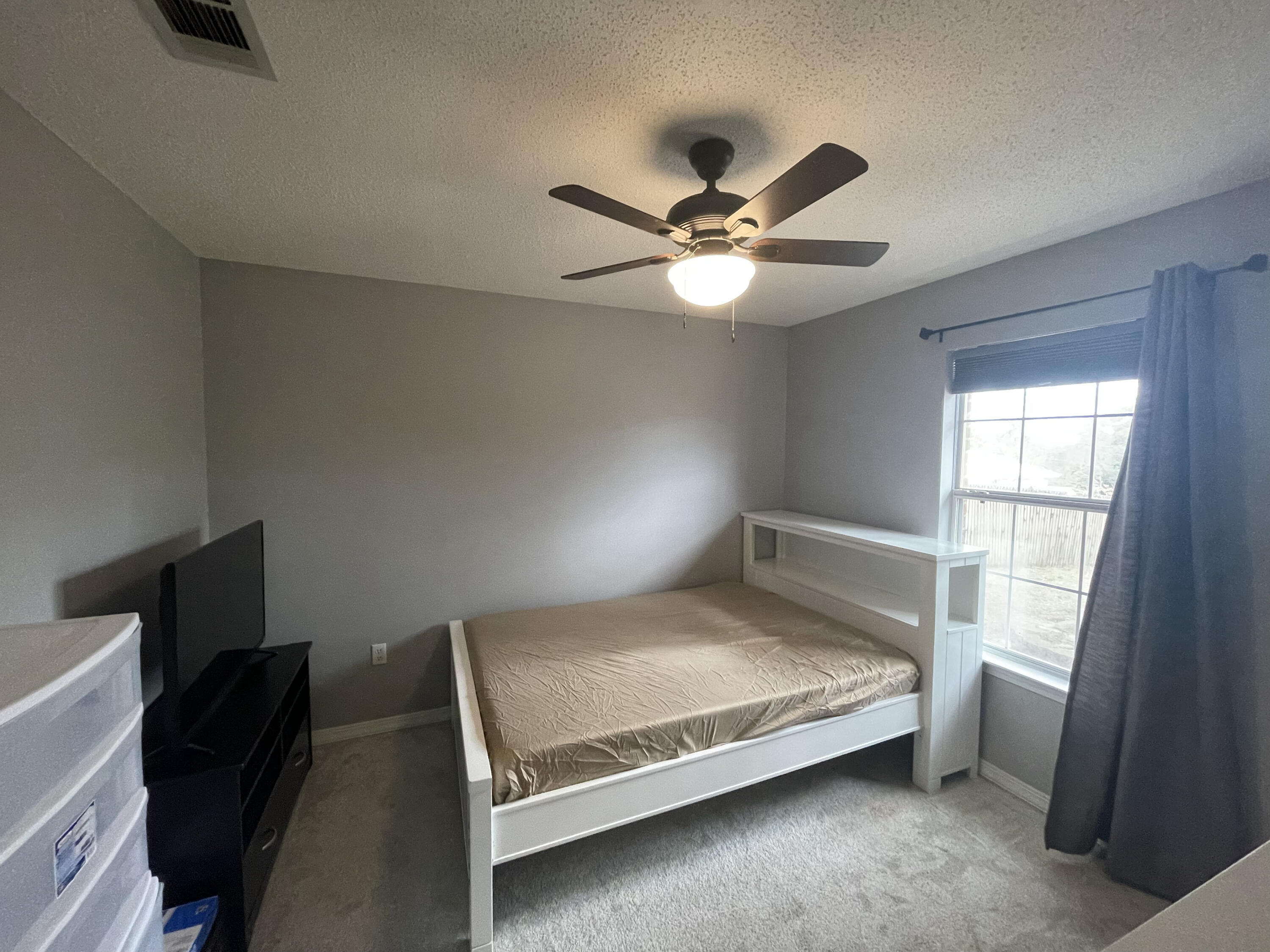 398 Riverchase Boulevard Crestview, FL 32536 - Photo 23 of 36 a bedroom with a bed and a window