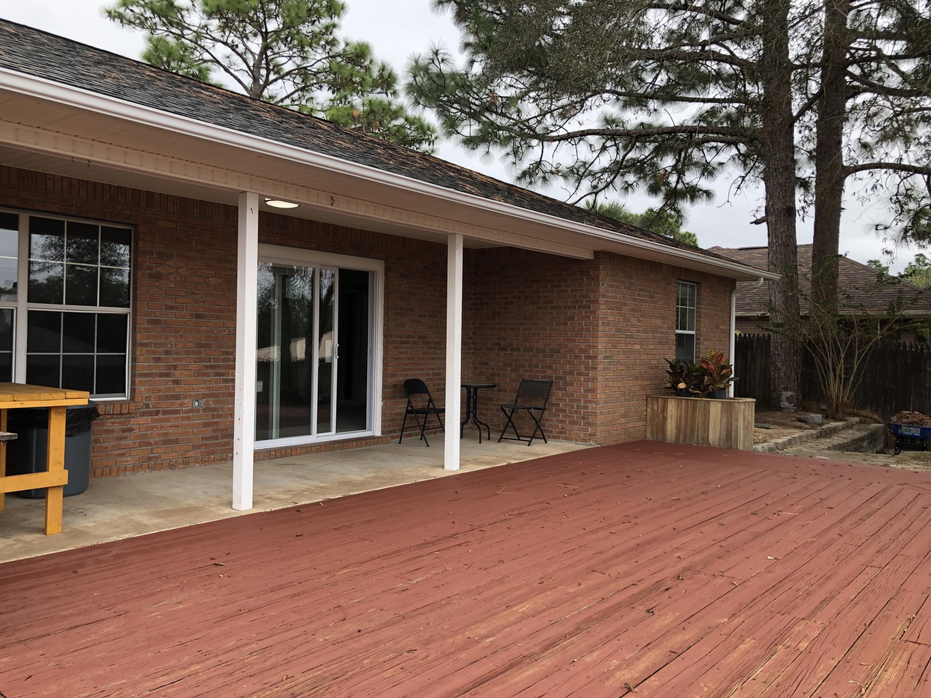 398 Riverchase Boulevard Crestview, FL 32536 - Photo 28 of 36 a view of a car garage of the house