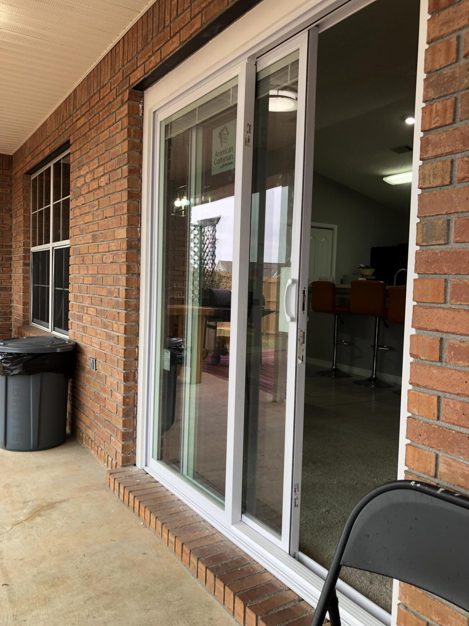 398 Riverchase Boulevard Crestview, FL 32536 - Photo 30 of 36 a view of a door and a window