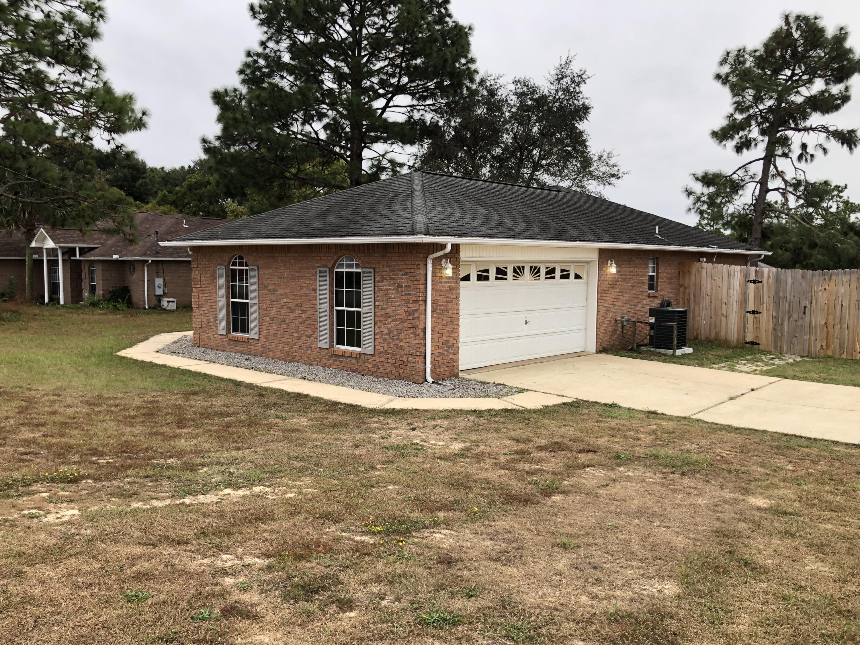 398 Riverchase Boulevard Crestview, FL 32536 - Photo 32 of 36 a view of a backyard