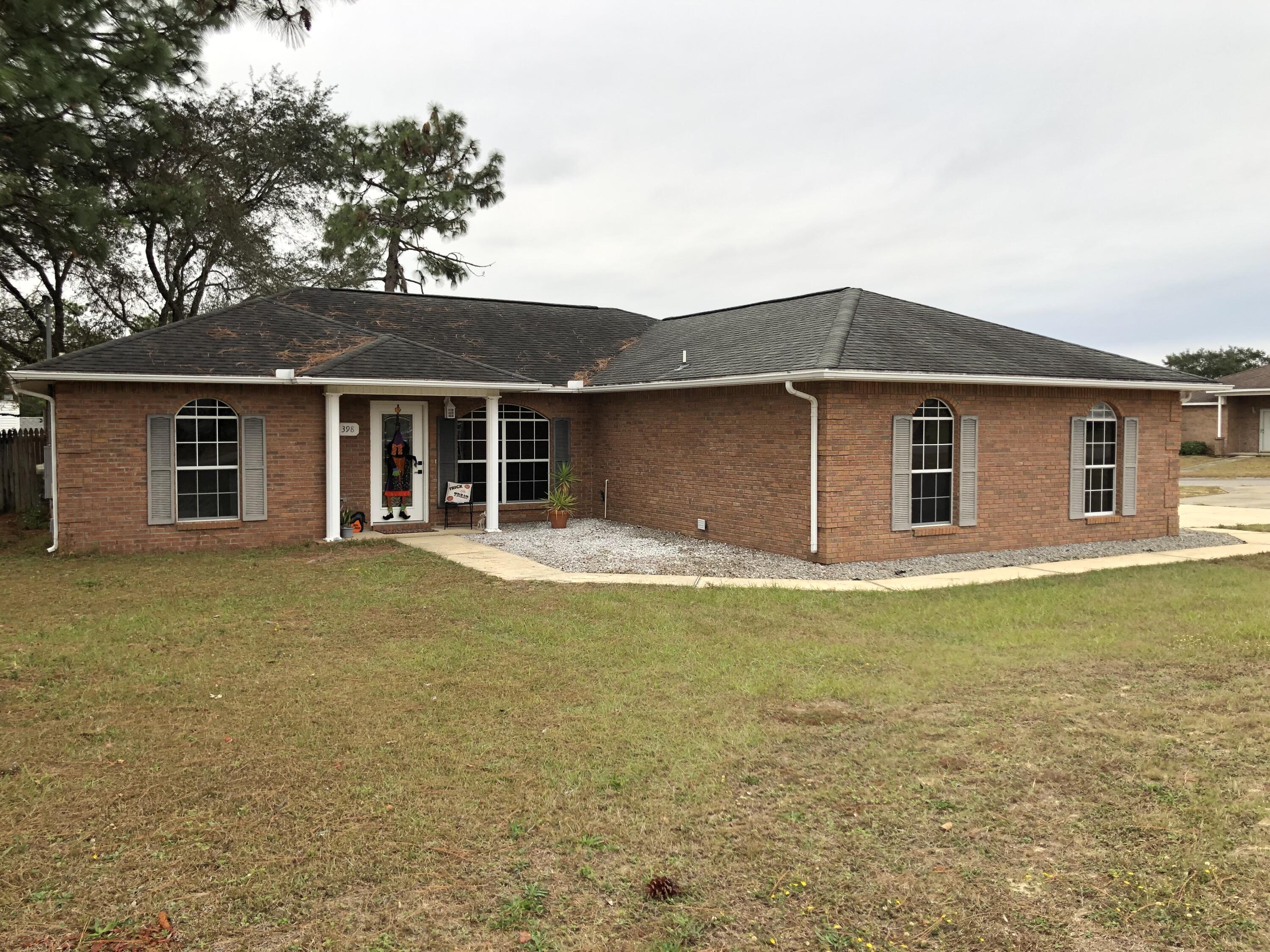 398 Riverchase Boulevard Crestview, FL 32536 - Photo 33 of 36 a view of a house with swimming pool