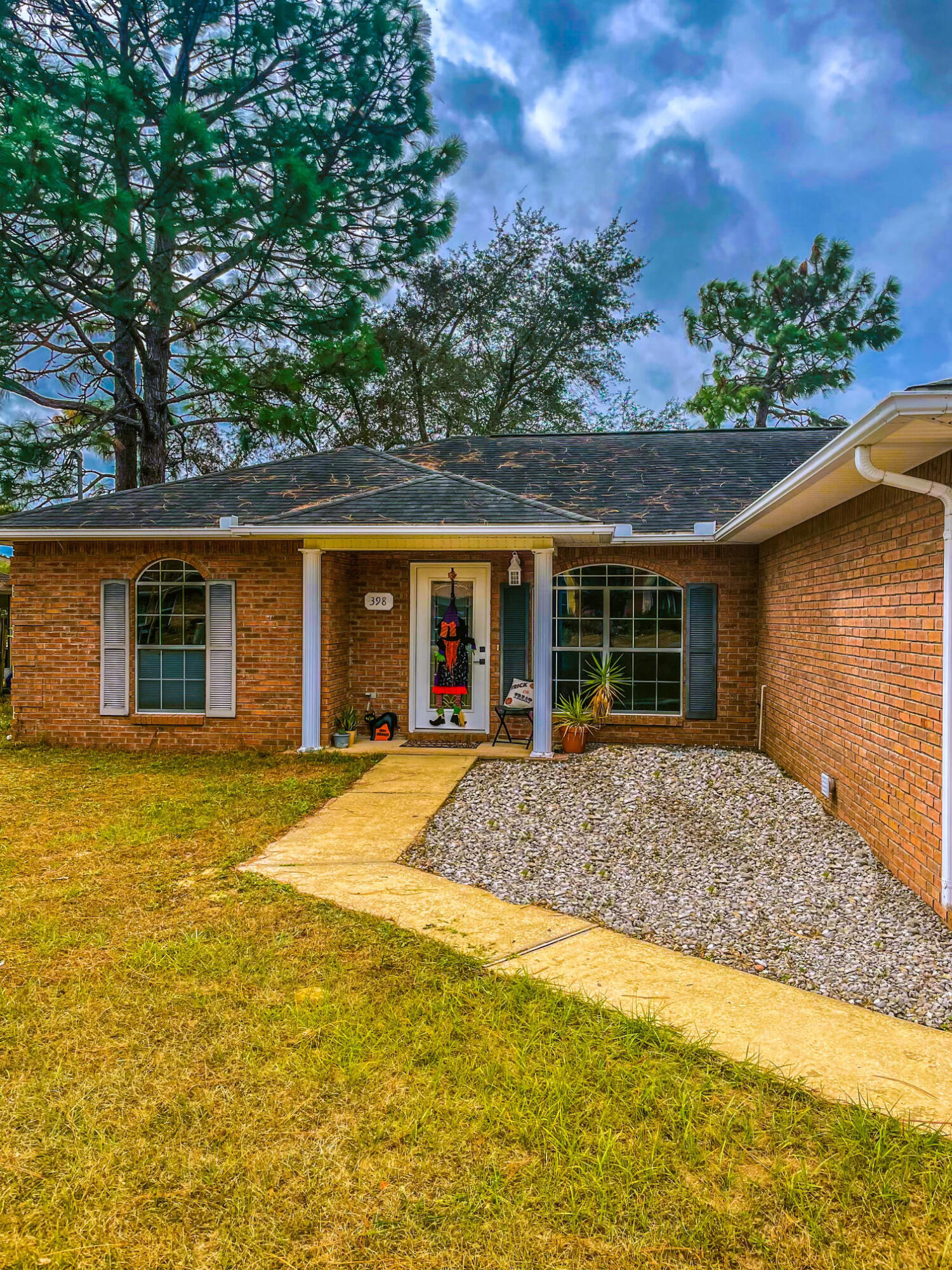 398 Riverchase Boulevard Crestview, FL 32536 - Photo 34 of 36 a view of house with outdoor space and seating area