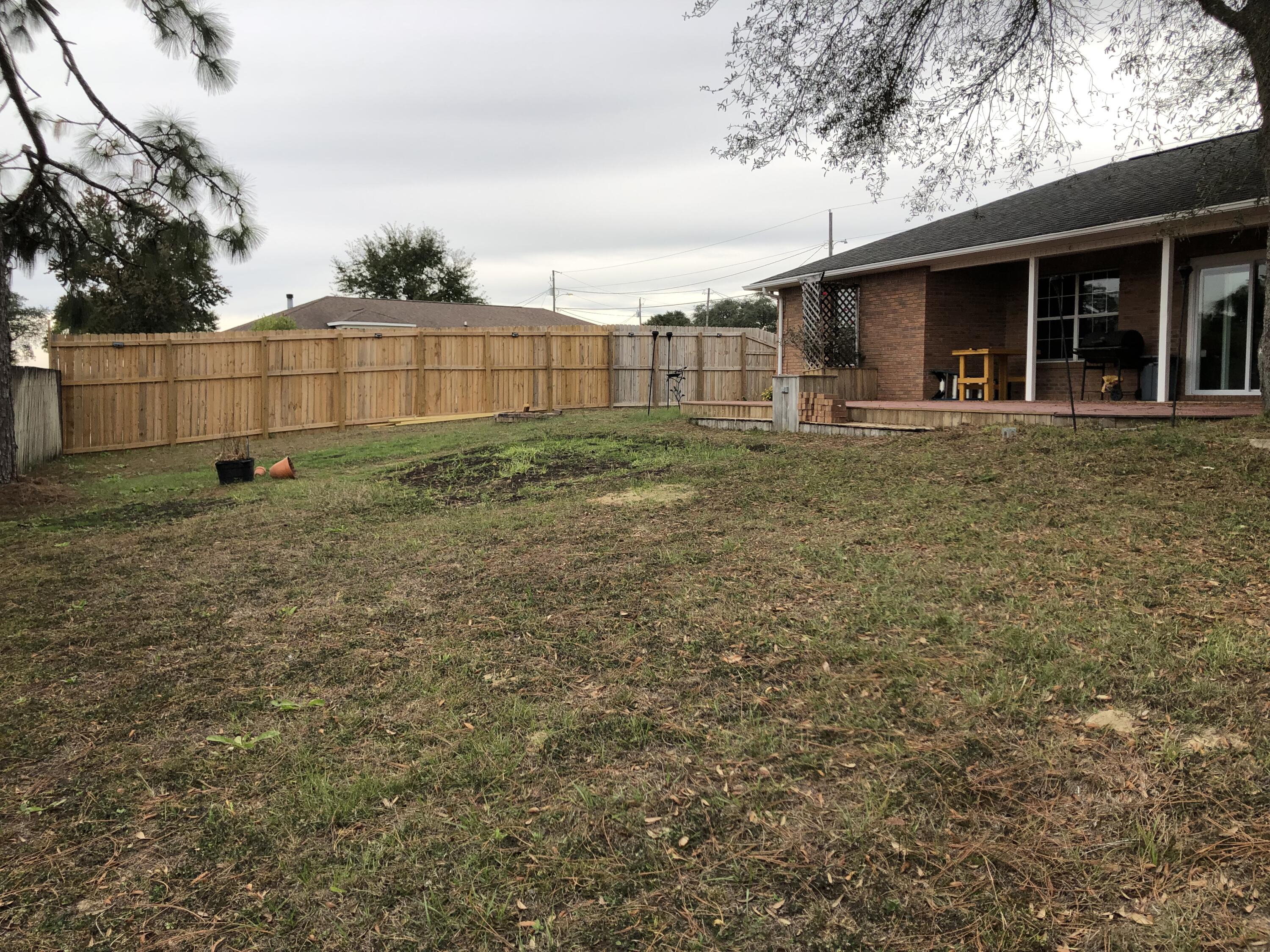 398 Riverchase Boulevard Crestview, FL 32536 - Photo 36 of 36 a view of a house with a backyard