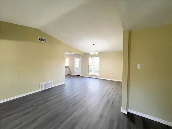 a bathroom with a toilet and a bathtub