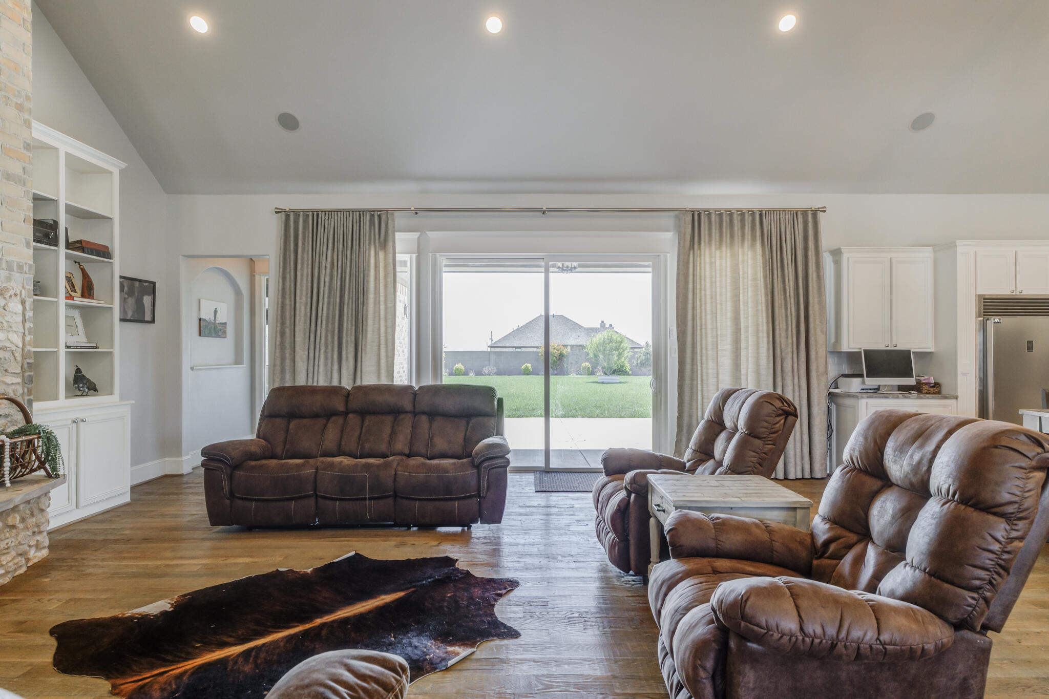8917 County Road 6870 Lubbock, TX 79407 - Photo 17 of 53 a living room with furniture or couch and a large window