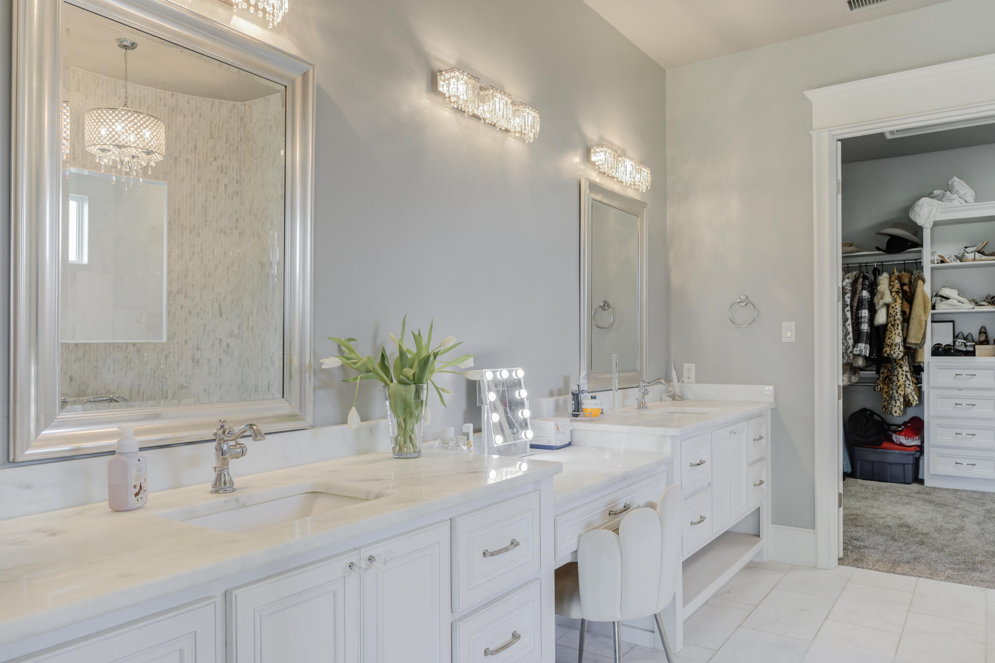 8917 County Road 6870 Lubbock, TX 79407 - Photo 23 of 53 a bathroom with a sink double vanity and a mirror