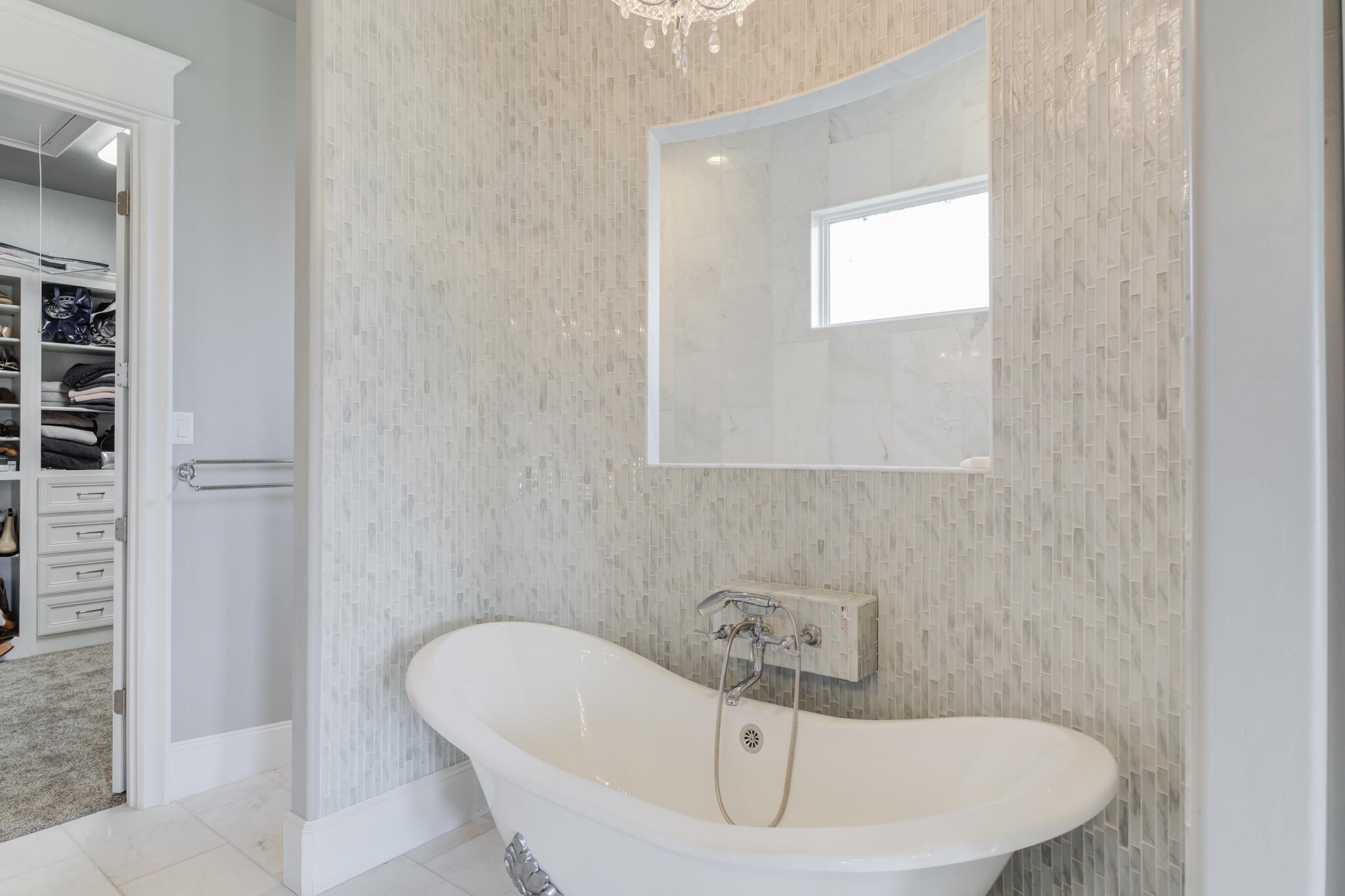 8917 County Road 6870 Lubbock, TX 79407 - Photo 24 of 53 a bathroom with a sink and bathtub